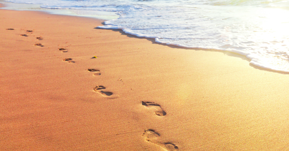 10491-footprints-in-sand-along-surf-edge-gettyimage